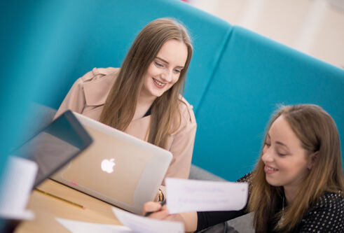 Students studying in a library