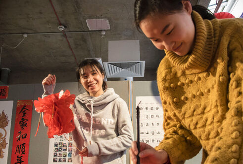 Students preparing decorations for Chinese New Year
