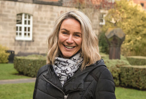Portrait of Dr Emma Burnett standing outside