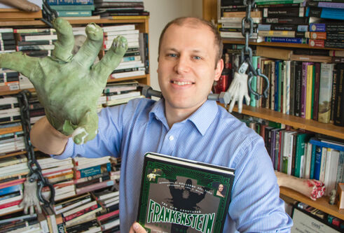 Daniel Cook with huge Frankenstein hand