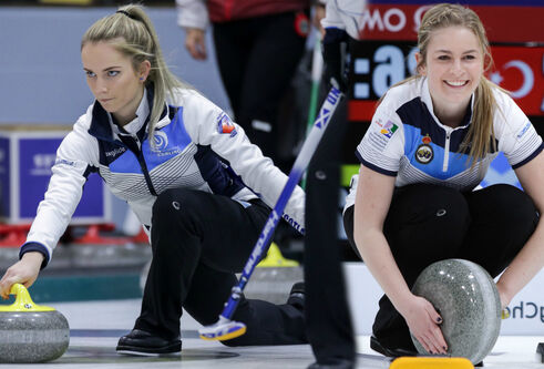 Leeanne McKenzie and Mili Smith on the curling ring