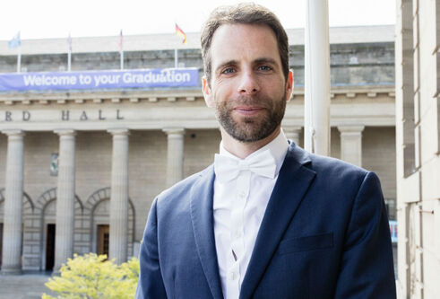 Mark Beaumont stands outside the Caird Hall
