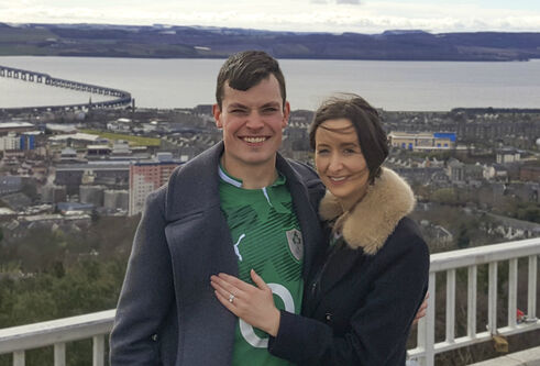 A student couple in front of the Firth of Tay