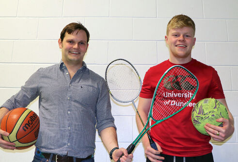 Students holding balls and rackets