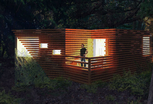 Luxury treehouse lit up at night