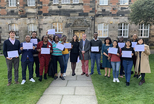 Students being presented with certificates