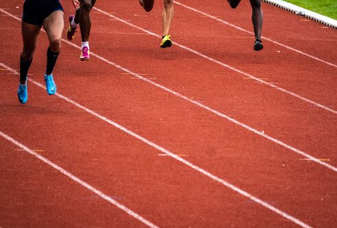 Feet on a running track