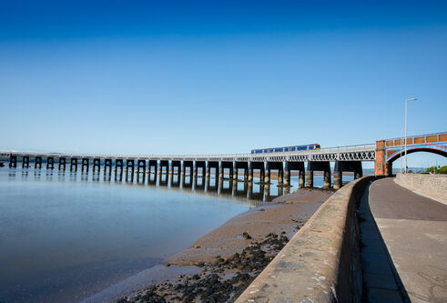 the tay rail bridge and a blue sky