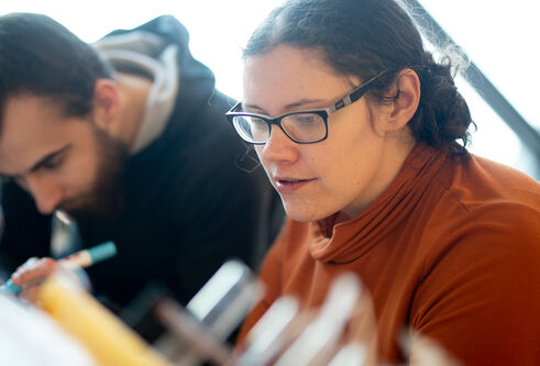 two students doing group work