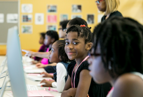 black girls at computers learning to code