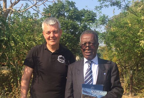 an image of Wiston next to another man