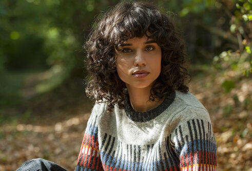 jasmine sitting in the woods