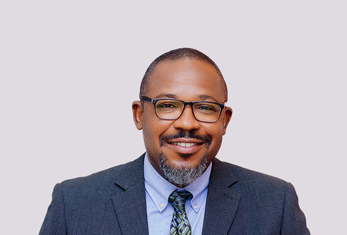 portrait of Major Selasie Atuwo wearing a suit