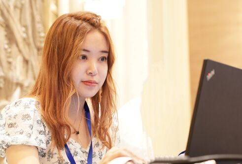 Crystal Tao using a laptop