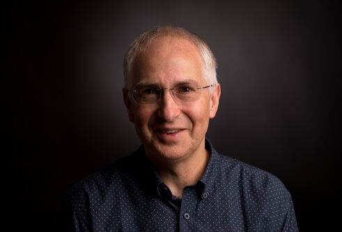 portrait of Ian Gilbert on black background