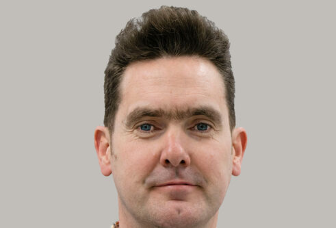 Portrait photo of John Rouse