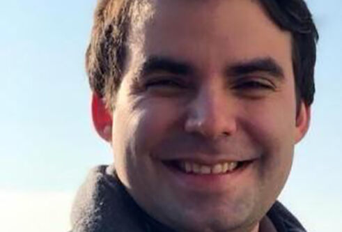 portrait of Kirby Swatek against blue sky
