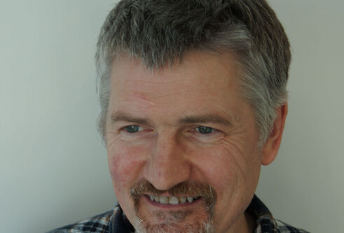 Portrait photo of Angus Lamond