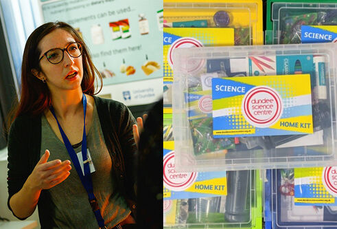 female lecturer standing next to packs of science centre kits