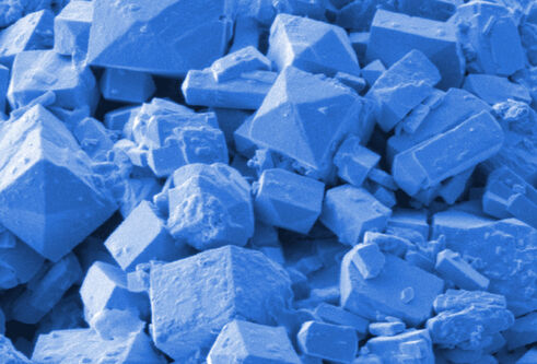 a pile of blue cubes and diamonds