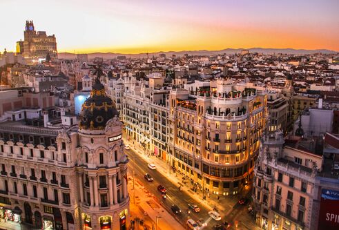 A dusk overhead photo looking down Gran Vía, Madrid