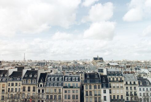 View over rooftops of traditional Parisian apartment buildings