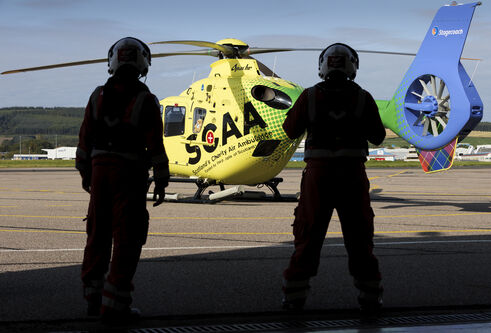SCAA helicopter and crew