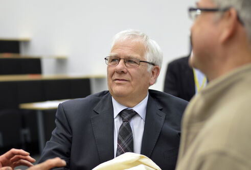 Picture of Eddie Small in lecture theatre