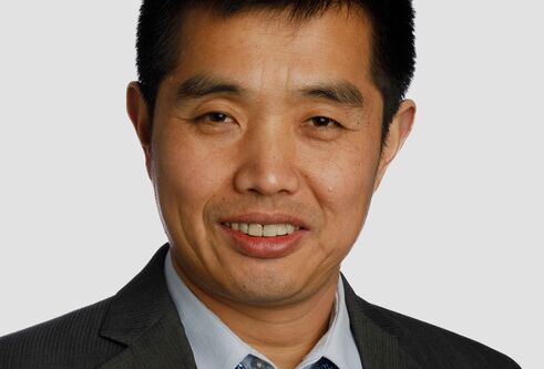 Portriat photo of Xiaoyi Shawn Mu