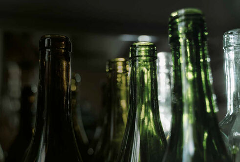 A close shot of a number of glass bottles