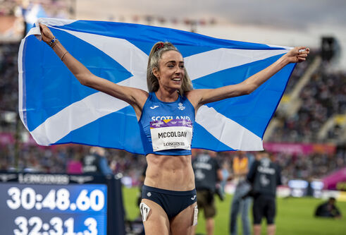 Pic of Eilish McColgan celebrating her Commonwealth Games win while flying Saltire