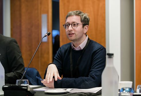 A person speaking at the conference.