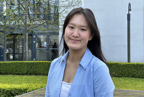 Jennie Yang standing outside the Life Sciences building.
