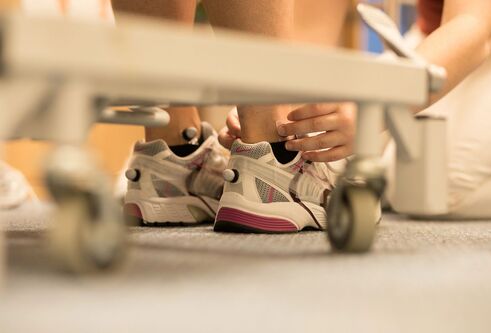 shoes with motion capture sensors on for tracking and studying motion.