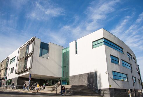 Dalhousie building with blue sky and clouds in the background.