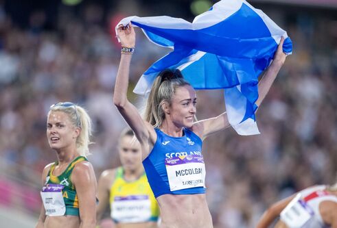 Eilish McColgan celebrate with the Scottish flag after winning the gold medal in the women's 10,000m final during the athletics competition at alexander stadium during the Birmingham 2022 commonwealth games. 