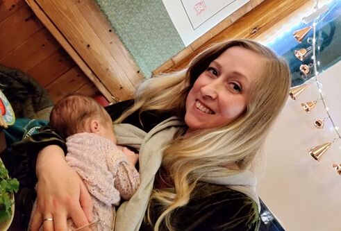 Beth Strachan breastfeeding her daughter