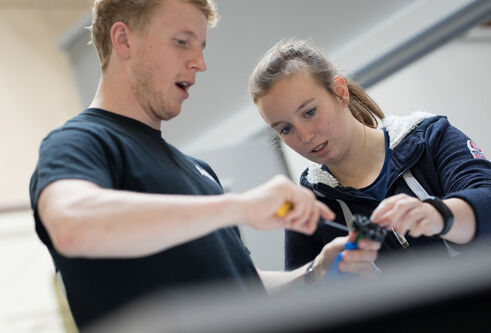 Mechanical Engineering students in a lab