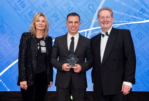 Dr Louigi Manfredi posing with his innovation-health technology award