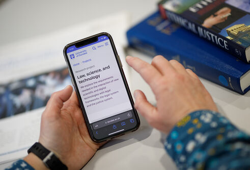 A person looking at a mobile screen