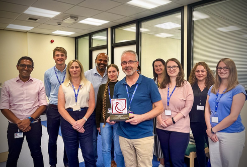 Professor Blair Smith and his team with the Honorary Life Membership of the Neuropathic Pain Group (NeuPSIG) award