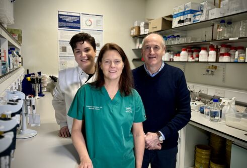 Members of the School of Medicine fertility research team in a lab setting