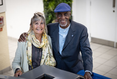Keith Harris and his wife, Helen, stand on the steps in DUSA where they first met while studying