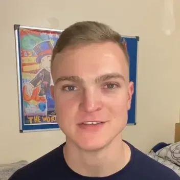 male student with microphone