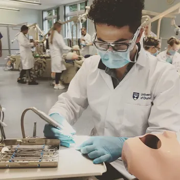 Dental student training in the lab