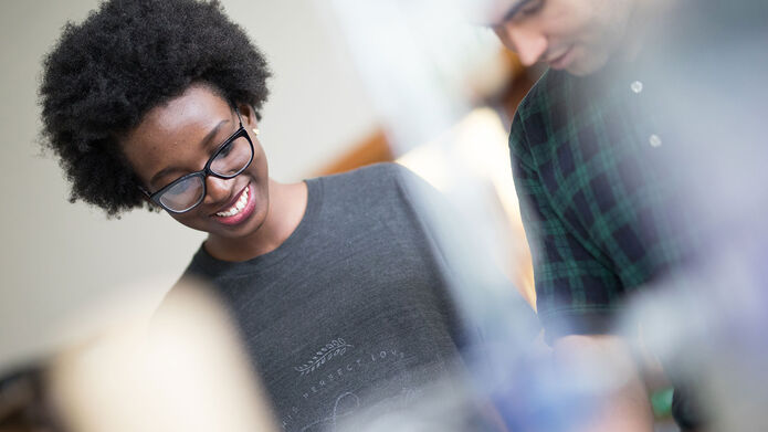 Photo of students working together