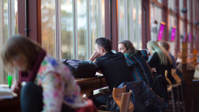 Students sat at the windows in Liar Bar