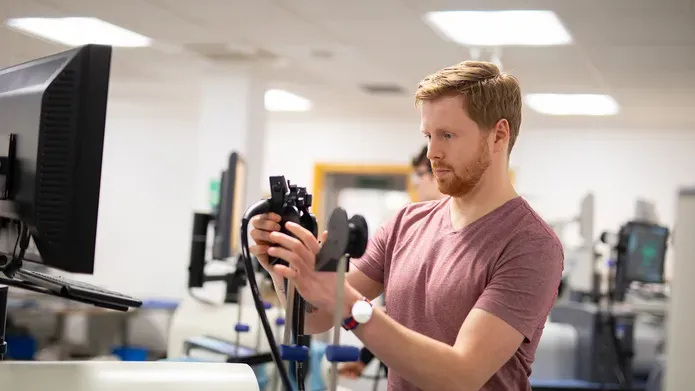 A student working with biomedical technology
