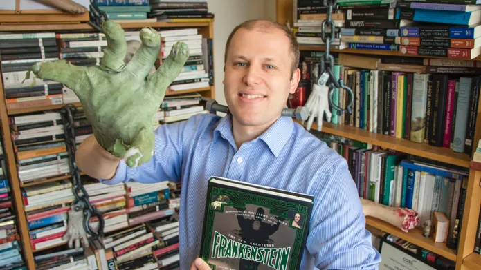 Daniel Cook with huge Frankenstein hand