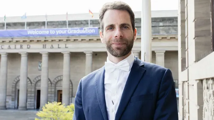 Mark Beaumont stands outside the Caird Hall